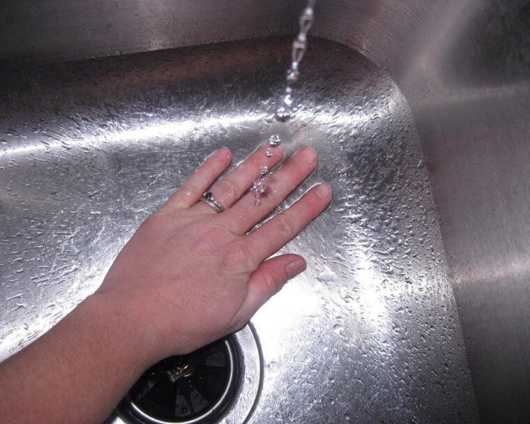 Smelly Hands From Chopping Onions and Garlic? Head to Your Stainless Steel Sink
