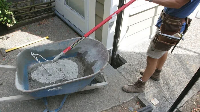 Use a Rake to Mix Concrete