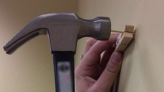 A Clothespin Comes in Handy to Save Your Fingers When Hammering a Nail